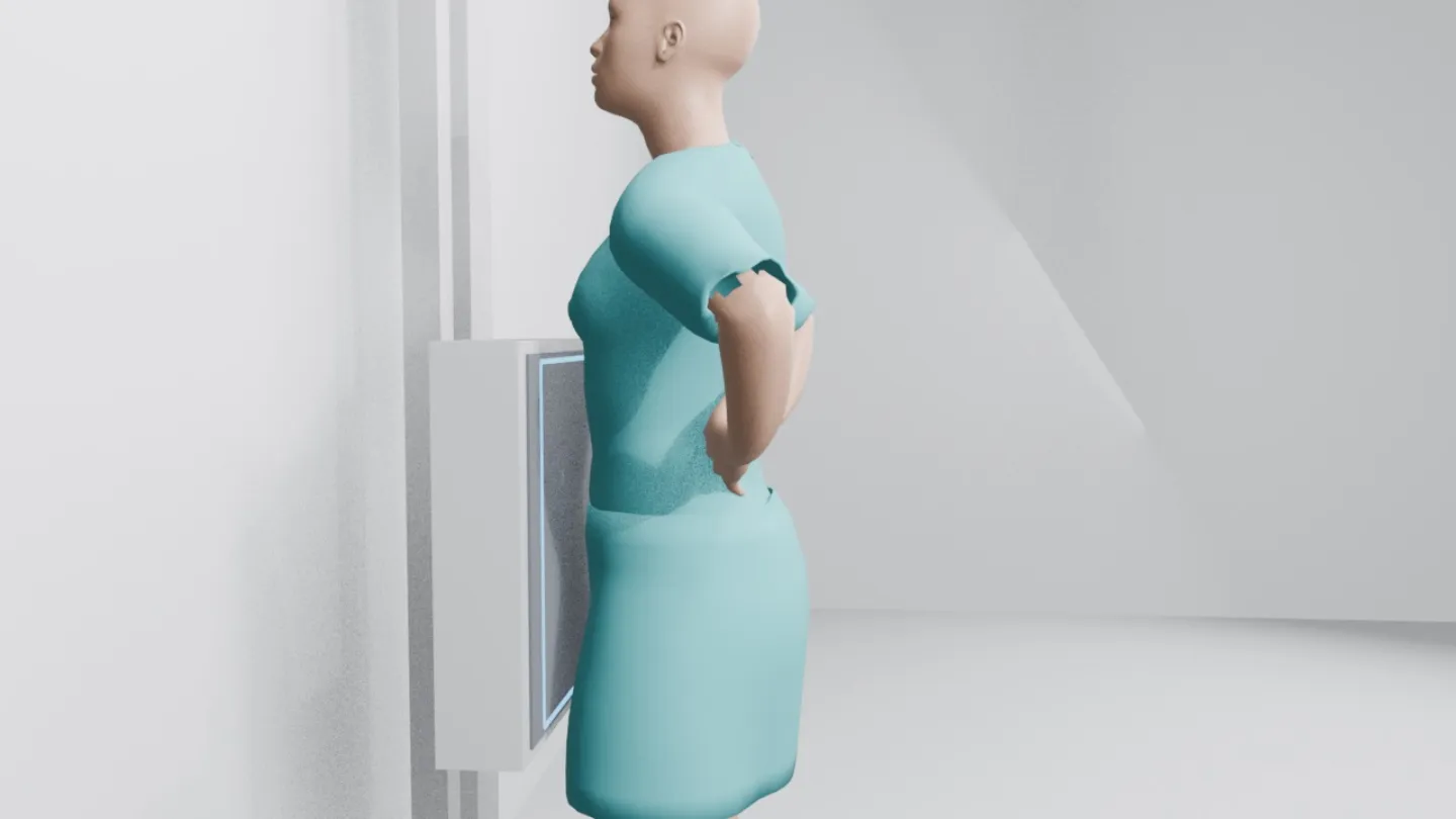 A still from a ScanFlo XR positioning video: a patient in a gown standing at the wall detector for a PA chest radiograph.